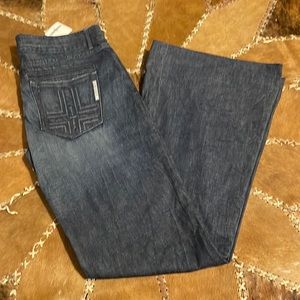 Never worn flare wide leg jeans. Trouser pockets